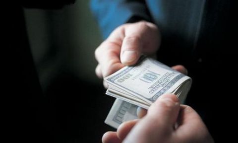 На Львівщині голова сільради попався на хабарі 3,5 тис доларів